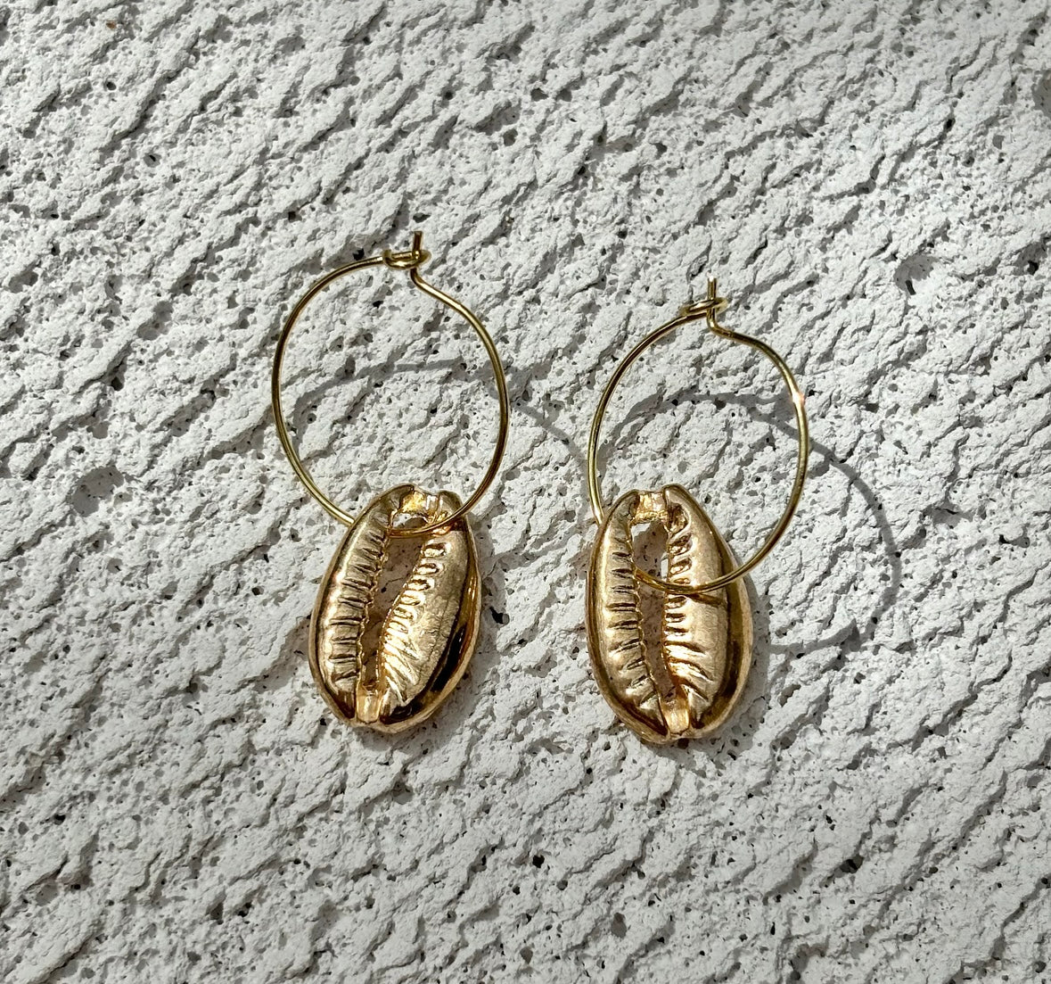 GOLD COWRIE EAR HOOPS